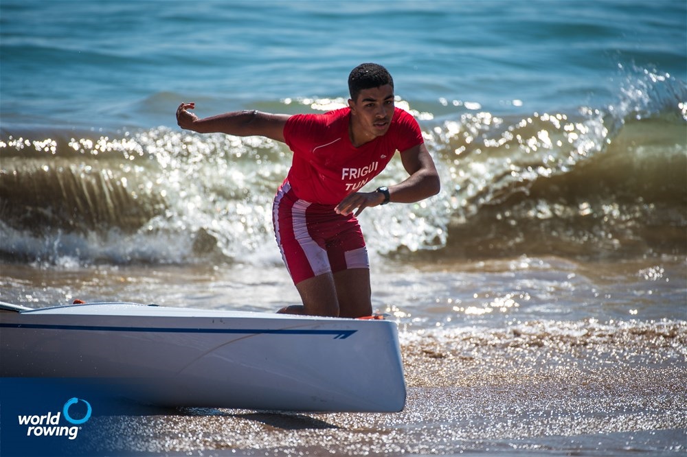 Bilel Frigui, Junior Men's Solo, Tunisia, 2021 World Rowing Beach Sprint Finals, Oeiras, Portugal / World Rowing/Benedict Tufnell